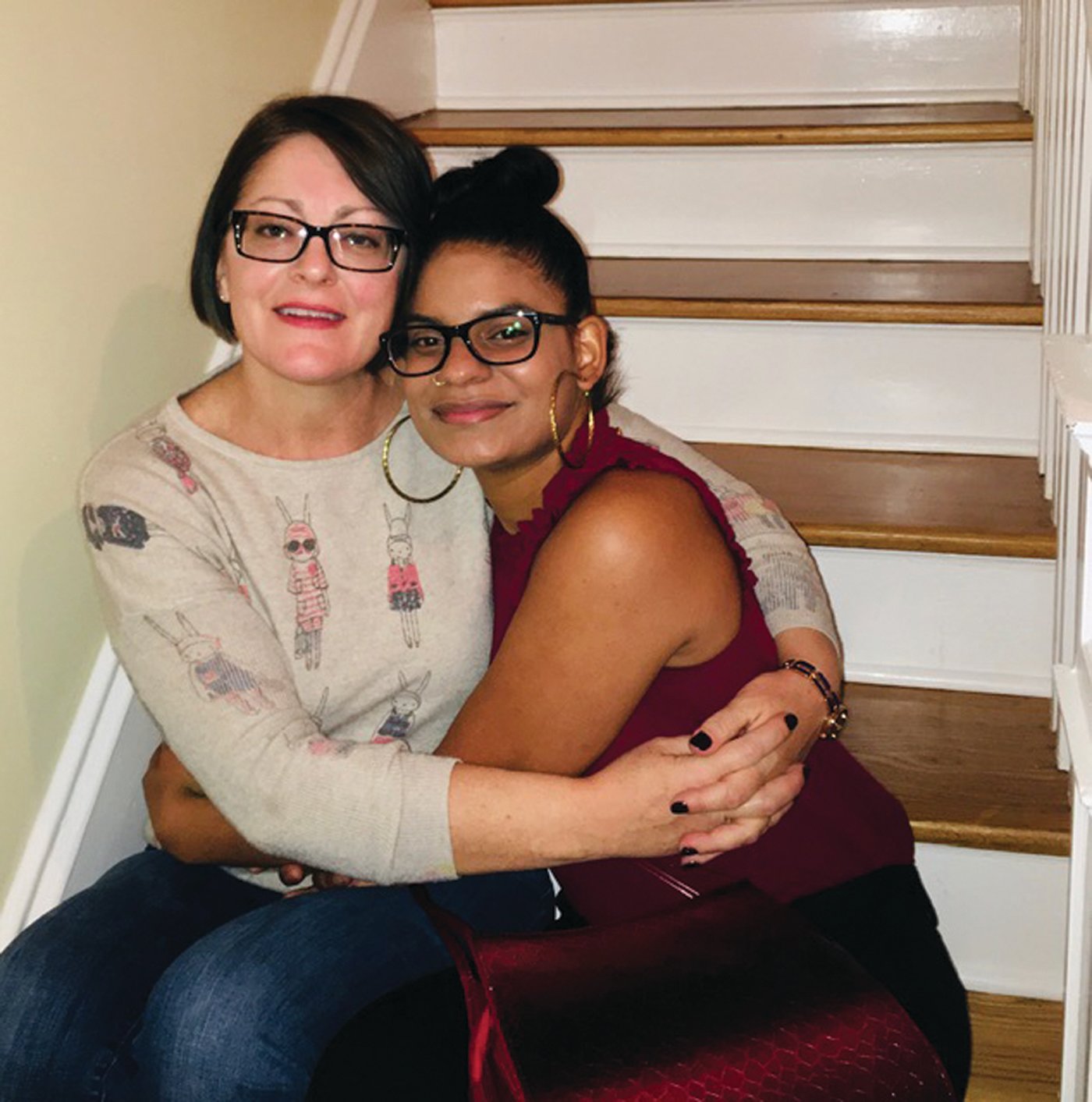 HUG FOR MOM: Fer Teresa Breto Johndrow steals a hug from her foster mother, Candace, in February. The pair had been eagerly awaiting Fer’s adoption at age 21, which took place remotely on Aug. 27.